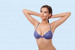 mummy makeover woman after a hybrid breast augmentation cost procedure