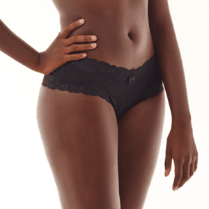a woman in knickers after a labiaplasty surgery